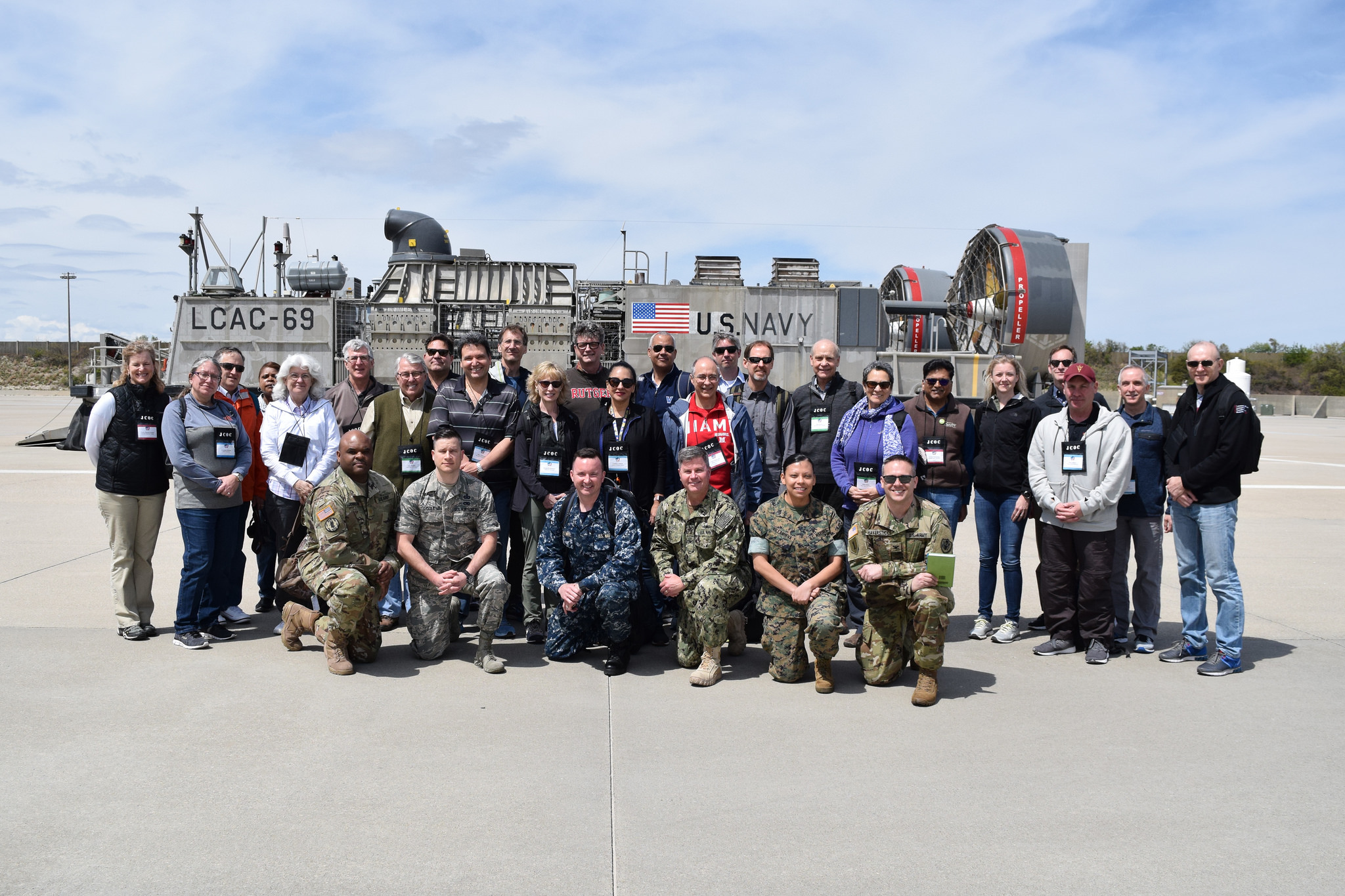 Vice Provost of Academic Operations Mark Todd (far right) and his JCOC cohort in front of a Landing Craft Air Cushion (LCAC) vehicle at the Joint Expeditionary Base Little Creek-Fort Story
