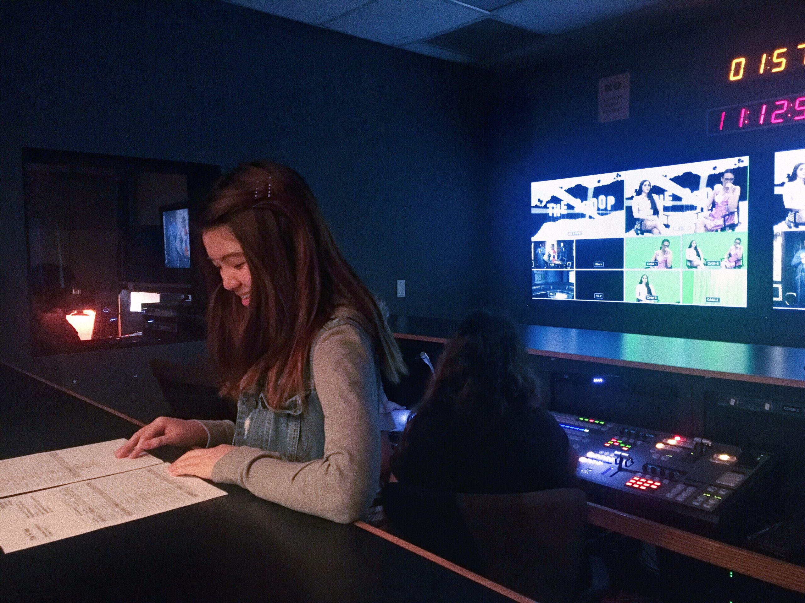 Michelle Au in TV control room