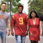 Four USC students walking together